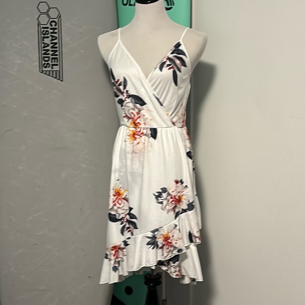 Sundress white with flowers and a ruffle